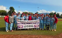The Cardinals players and coaches gathered on the field, holding the BC Premier Baseball League's Provincial Premier Champion 2026 banner.